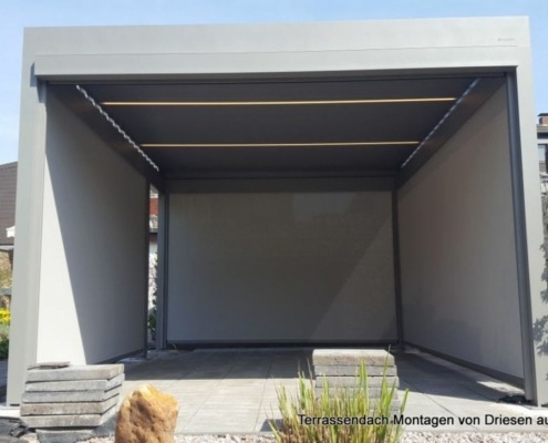 terrassenberdachung_mit_zipmarkisen_als_windschutz_sonnenschutz-a356ae1a